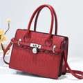 “Gucci branded leather shoulder bag with elegant design, luxury designer