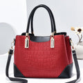 “Gucci branded leather shoulder bag with elegant design, luxury designer