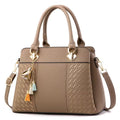“Gucci branded leather shoulder bag with elegant design, luxury designer