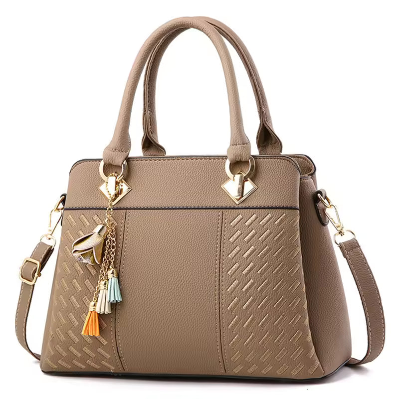 “Gucci branded leather shoulder bag with elegant design, luxury designer
